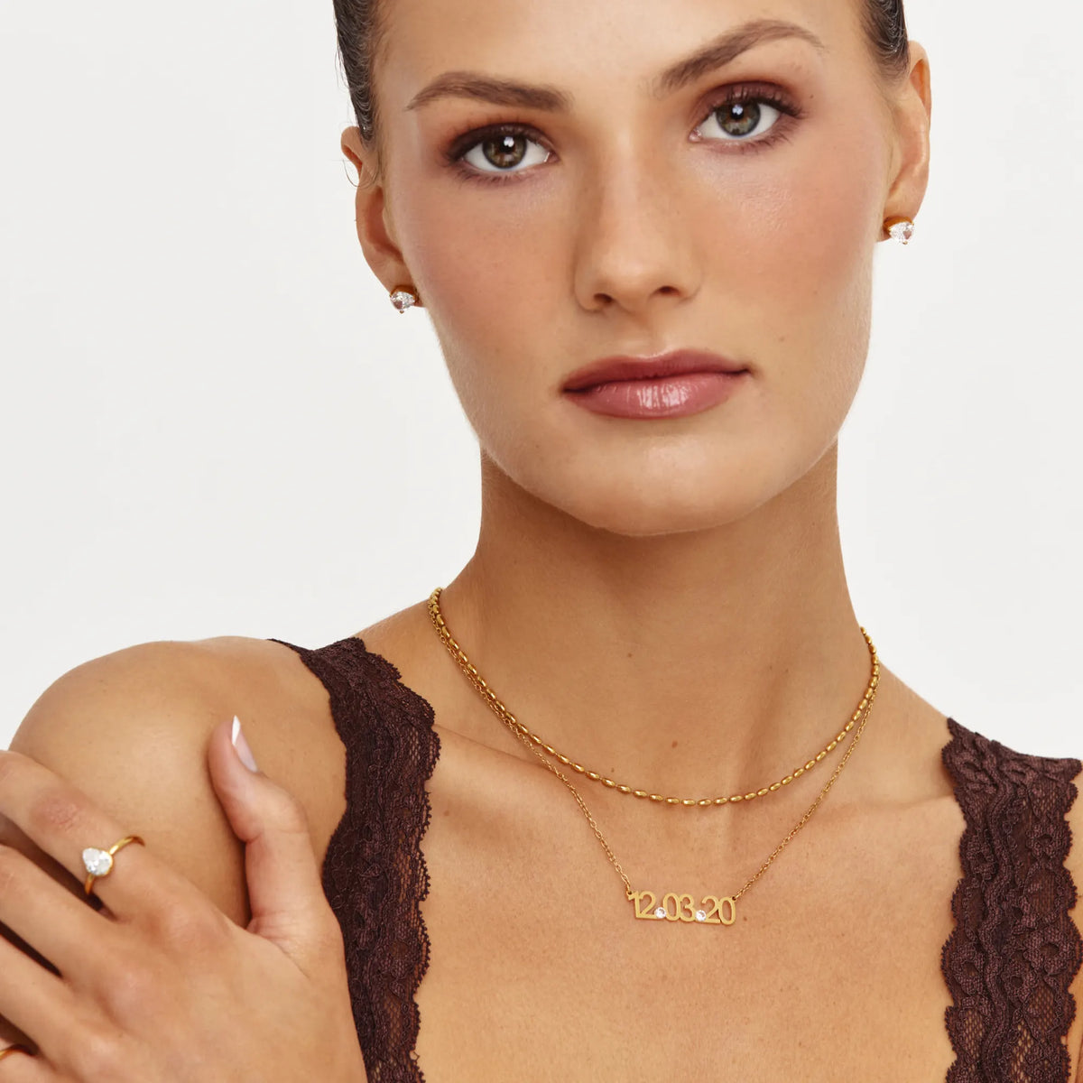 Custom Date Necklace layered with a second gold necklace