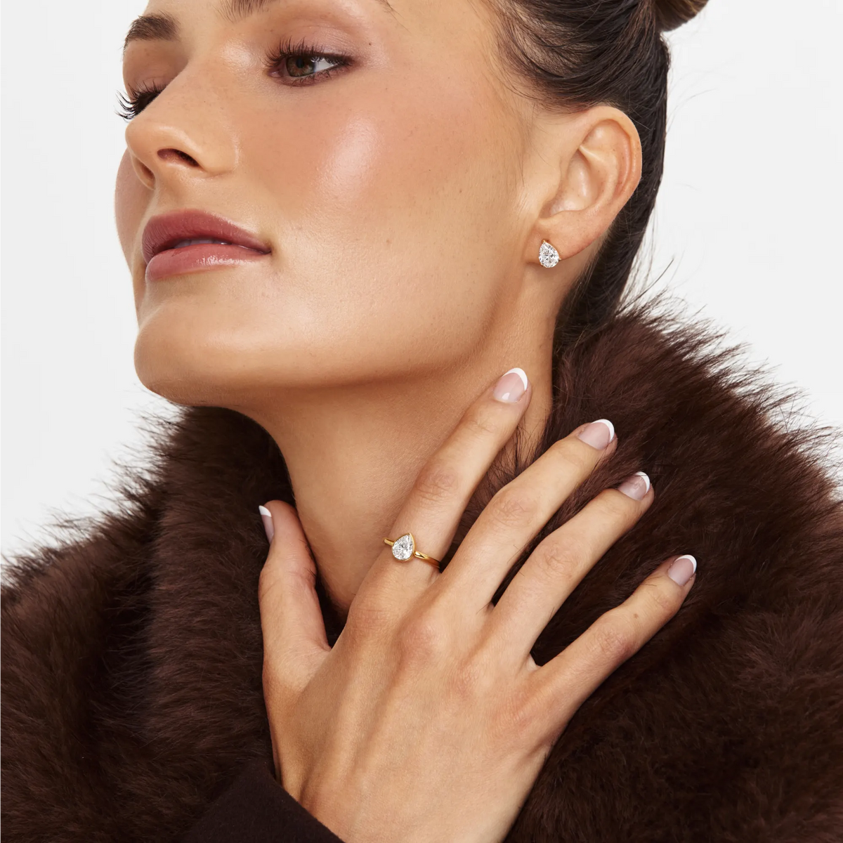 Pear Studs in gold worn with a matching ring